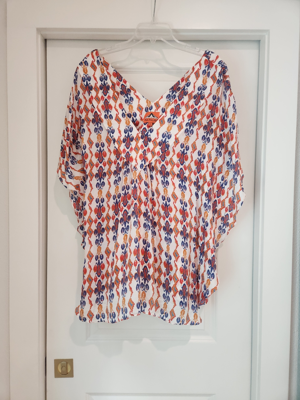 Pia Pauro V-Neck Ikat Print Tunic Top in White with Blue & Orange